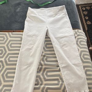 White, 10 P ankle length. Made with ration, nylon and spandex.